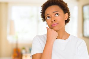 Hazlet homeowner thinking about which questions to ask when choosing a chimney service